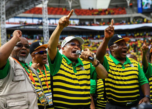 Gwede Mantashe, President Jacob Zuma and Deputy President Cyril Ramaphosa dancing during the ANC election manifesto launch in Port Elizabeth on 16 April 2016.