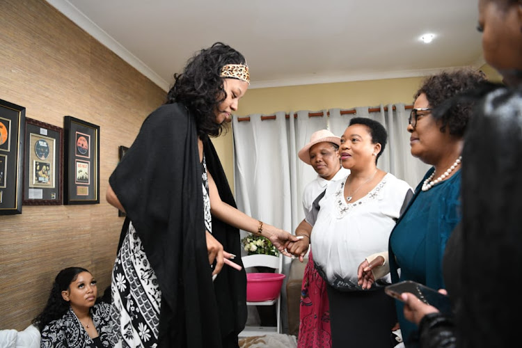 KZN premier Nomusa Dube-Ncube speaks with the late Mandla 'Mampintsha' Maphumulo's wife, Babes Wodumo, during a visit to the family on Thursday.