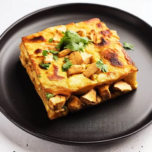 Schezwan Chicken Bread Omelette