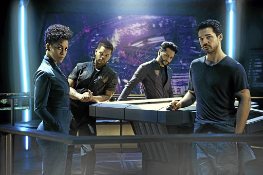 Dominique Tipper as Naomi Nagata, Wes Chatham as Amos Burton, Cas Anvar as Alex Kamal and Steven Strait as Earther James Holden in 'The Expanse', now streaming on Netflix.