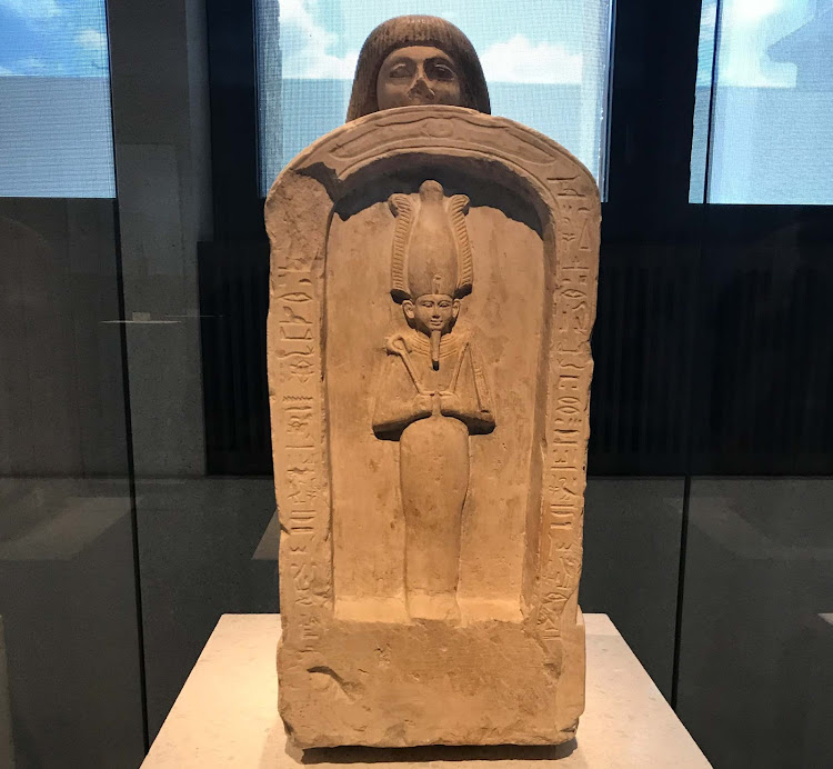 Kneeling figure of Setau, viceroy of Kush, holding a stela, during the reign of Egyptian pharaoh Ramses II, 1213-1279 B.C. At the Neues Museum in Berlin. 