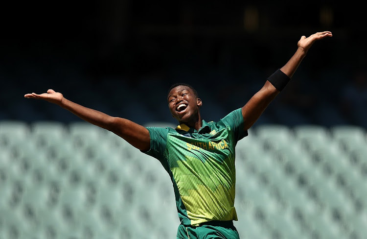 Lungi Ngidi of South Africa celebrates after taking the wicket of Travis Head of Australia during game two of the Gillette One Day International series between Australia and South Africa at Adelaide Oval on November 09, 2018 in Adelaide, Australia.