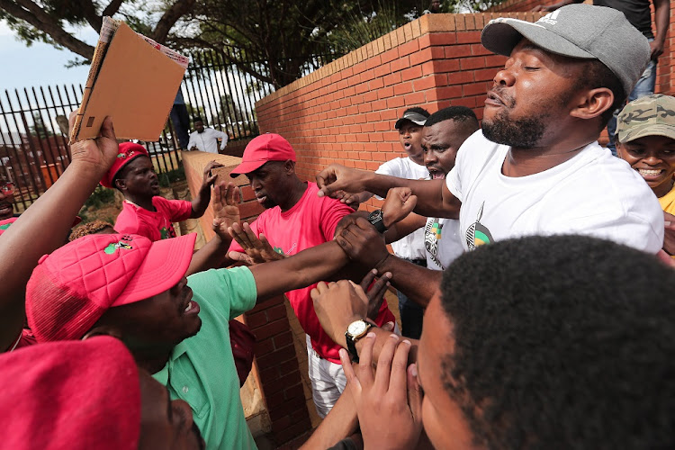 Members of the EFF clash with a members of the ANC after an ANC member provoked the group outside the Randburg Magistrate’s court in Johannesburg after the Magistrate ordered that former Deputy Higher Education Minister Mduduzi Manana is fined R100 000 and to pay R5000 and R20000 to his victims and does 500 hours community service. Manana was filmed assaulting two woman and pleaded guilty to the offence.