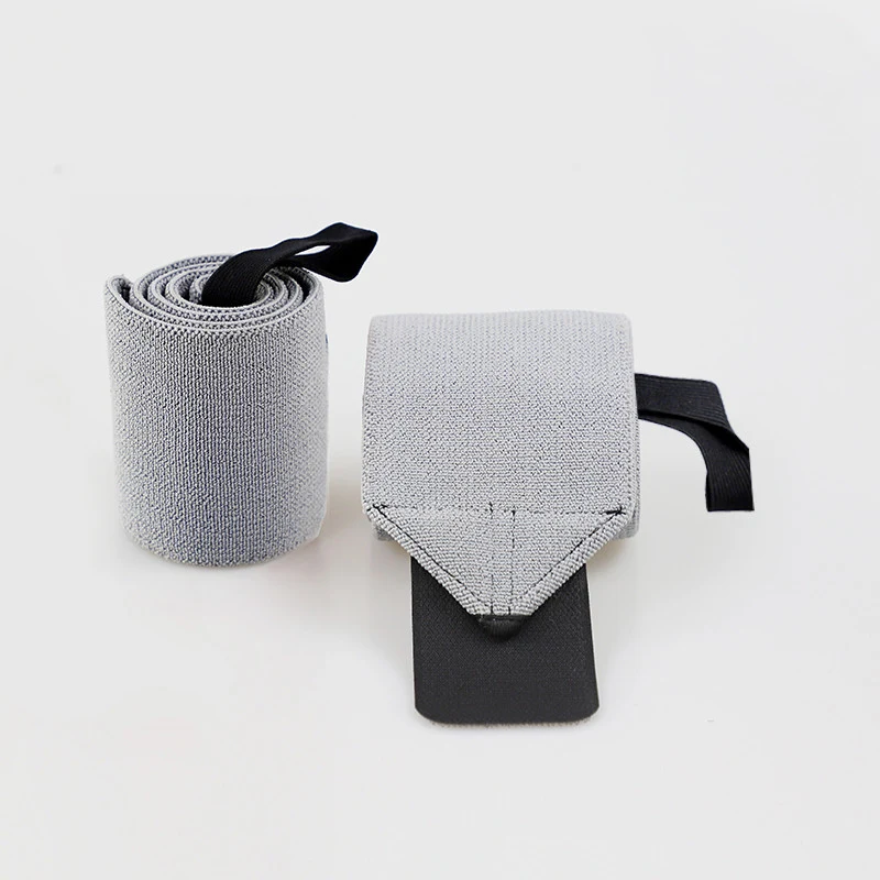 Bande de poignet fitness épaisse, hautement élastique et personnalisée. Bandage en nylon pour protéger le poignet pendant l'entraînement.