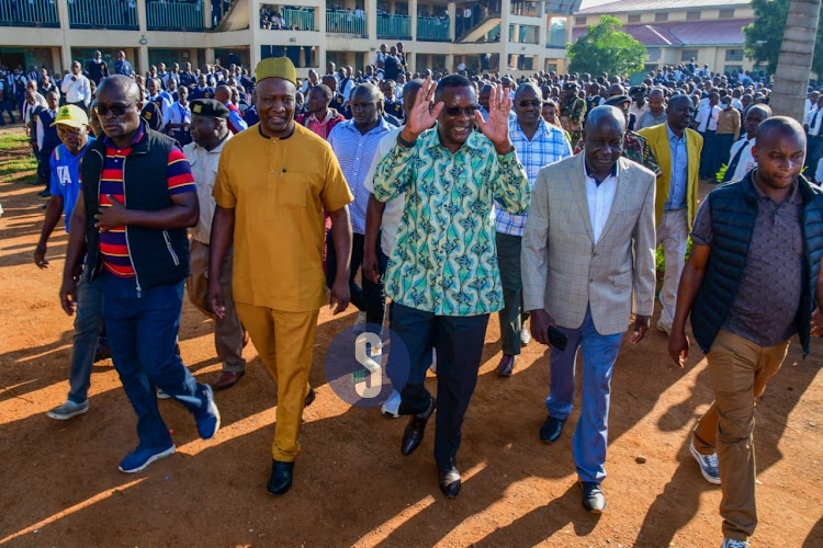 CS Eliud Owalo, Oyugi Dor (left) and Ambira High School Principal Otieno Kauko (right) on May 8, 2023.