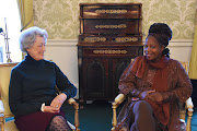 Lady Susan Hussey (left) meets Ngozi Fulani, founder of the charity Sistah Space in the Regency room in Buckingham Palace on December 16 2022 in London, England.