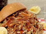 Pulled Pork with Apple Cider Sauce {slow cooker recipe} was pinched from <a href="http://www.caramelpotatoes.com/2013/04/08/pulled-pork-with-apple-cider-sauce-slow-cooker-recipe/" target="_blank">www.caramelpotatoes.com.</a>