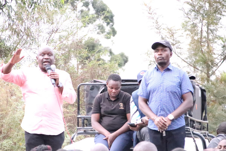 Former ICT and Infrastructure special secretary in deputy president's office Maurice Kakai and former Rift Valley regional commissioner George Natembeya in Kananachi village