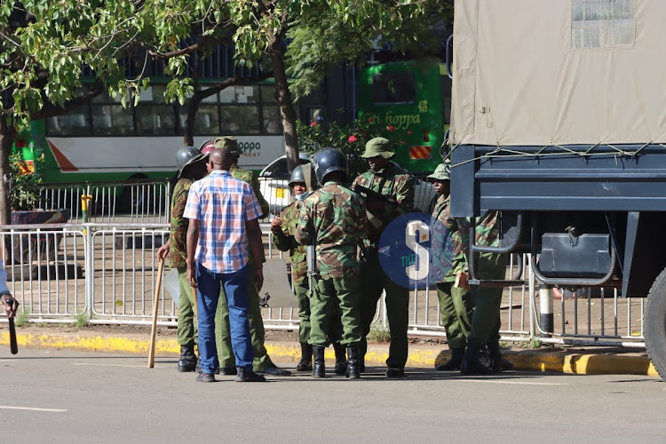 Anti-riot police office on standby at Kencom building along Moi Avenue Nairobi on March 27, 2023