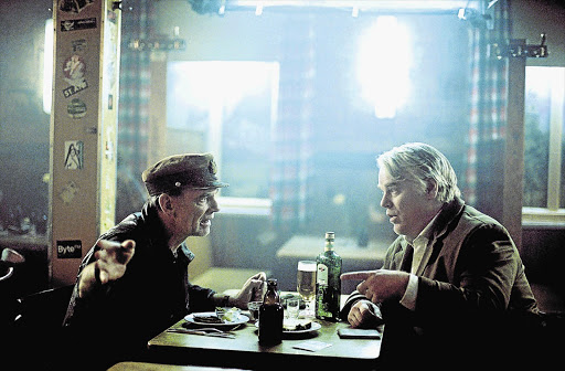 CHECKMATE: Anton Corbijn's 'A Most Wanted Man' stars Philip Seymour Hoffman, right, in one of his last performances