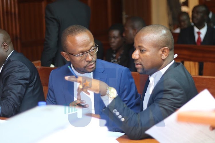 Lawyers Cecil Miller and George Kithi at a Milimani court on Friday, December 6, 2019.