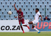 Thabo Matlaba of Swallows FC challenged by Ibraheem Jabaar of Stellenbosch FCduring the DStv Premiership 2021/22 match between Swallows FC and Stellenbosch FC.