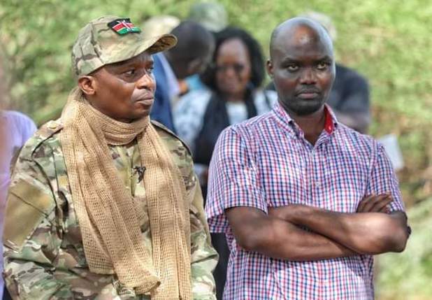 CS for Interior Kithure Kinfdiki with Governor for Elgeyo Marakwet Wisley Rotich during a security meeting at Kolowa in Kerio Valley on April 29.