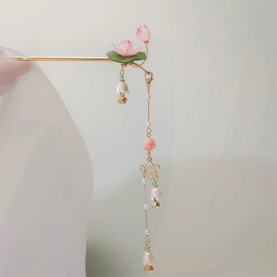 Antieke Tassel Lotus Haarspeld Oorbellen, elegante dames sieraden, perfect voor een chique look. Dit haaraccessoire maakt je outfit af