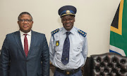 Minister Mbalula stands with General Khehla John Sitole, who has been appointed the new National Police Commissioner. 