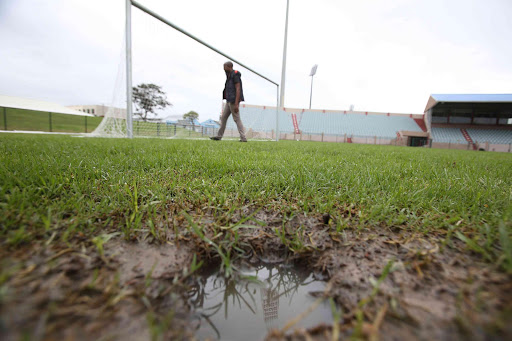 MUDDIED MESS: Soccer tournament at Buffalo City Stadium was called off due to a waterlogged pitch after heavy downpours at the weekend Picture: MARK ANDREWS