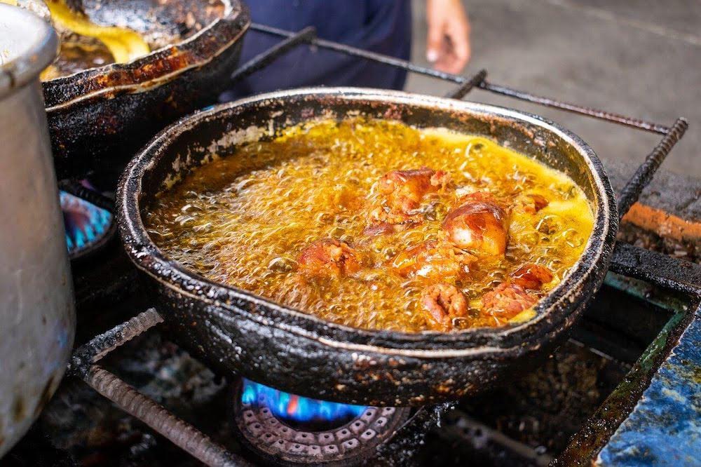 food-ecuador-manabi-dinner shown to be cooked over a flame in a pot