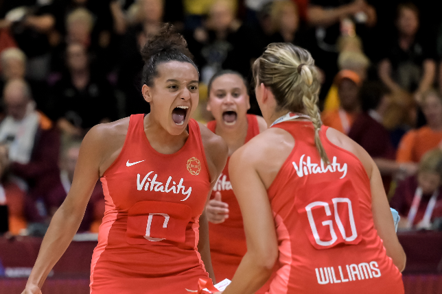 Francesca Williams of England celebrates with teammates after they beat New Zealand to book a place in the 2023 Netball World Cup final.