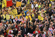  Protesters gather amongst well-wishers in Trafalgar Square ahead of the Coronation of King Charles III and Queen Camilla on May 6, 2023 in London, England. The Coronation of Charles III and his wife, Camilla, as King and Queen of the United Kingdom of Great Britain and Northern Ireland, and the other Commonwealth realms takes place at Westminster Abbey today. Charles acceded to the throne on 8 September 2022, upon the death of his mother, Elizabeth II.