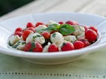 Marinated Mozzarella, Cherry Tomato, and Basil Salad was pinched from <a href="http://www.seriouseats.com/recipes/2012/08/marinated-mozzarella-cherry-tomato-basil-salad-recipe.html?utm_source=Serious%20Eats%20Newsletters" target="_blank">www.seriouseats.com.</a>