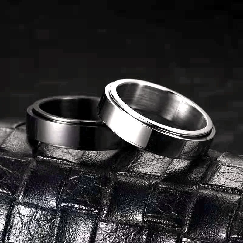 Titanium Steel Glossy Rotatable Lettering Ring. Personalize your style with this durable and elegant ring, expressing yo