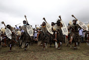 Members of Ebuhleni Nazareth Baptist Church perform during the uMgidi Ceremony at KwaKhangelamankengane royal palace