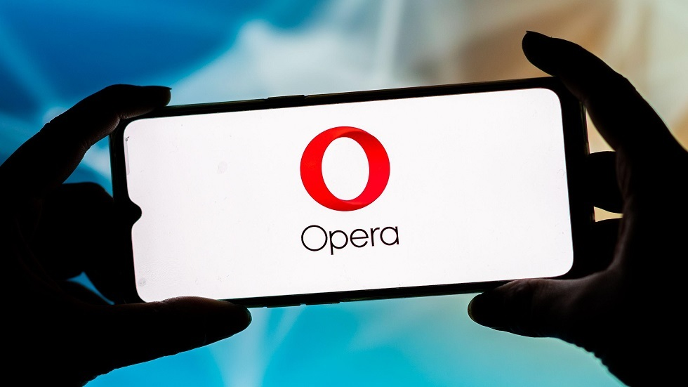 Opera Ltd staff using the newly released Opera Crypto Browser on smartphone. 