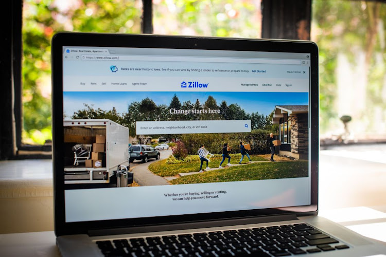 The Zillow website is shown on a laptop computer arranged in Dobbs Ferry, New York, US. File photo: BLOOMBERG/TIFFANY HAGLER-GEARD