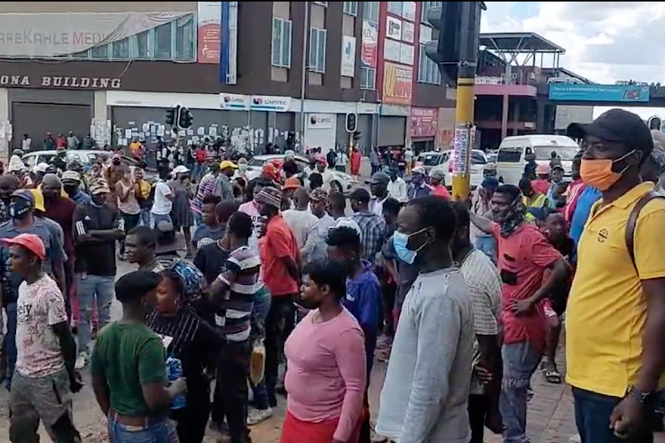 Residents and migrant shop owners clashed in Alexandra on March 7 2022. Residents, who said they belong to the Dudula Movement, want undocumented migrants to leave the area.