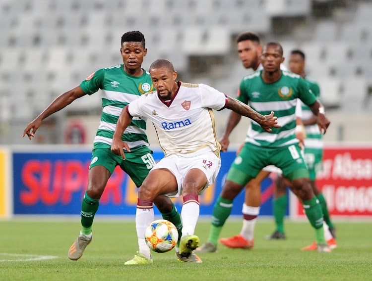 Granwald Scott of Stellenbosch FC is challenged by Menzi Masuku of Bloemfontein Celtic during the Absa Premiership 2019/20 game between Stellenbosch and Bloemfontein Celtic at Cape Town Stadium, Cape Town on 7 January 2020.