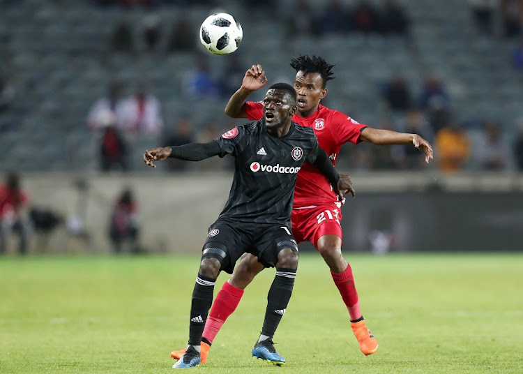 Augustine Mulenga of Orlando Pirates shields ball from Luckyboy Mokoena of Highlands Park during the Absa Premiership 2018/19 match between Orlando Pirates and Highlands Park at the Orlando Stadium, Soweto on 04 August 2018.