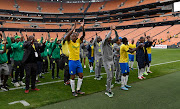 Mamelodi Sundowns players celebrate with fans during the Caf Champions League match against Al Merrikh at FNB Stadium in Johannesburg on April 2 2022.