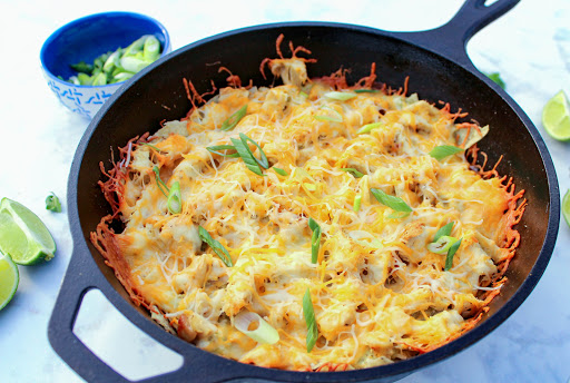 Chicken chilaquiles in a cast iron pan.