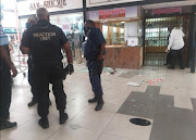 Two jewellery stores were robbed by armed men and then looted by bystanders at the Phoenix Plaza in Durban on Monday.