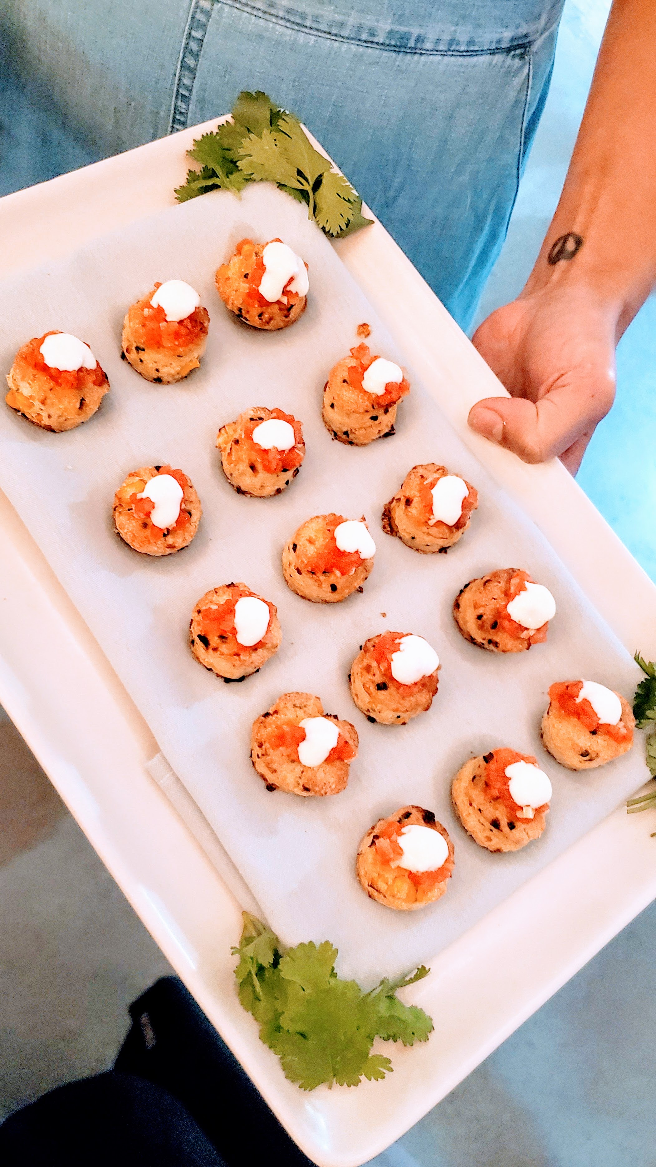 Appetizer of Corn Biscuit, Tomato, Hollandaise, by Gina Helvie, Trinket for the More Zero Proof Dinner at Feast 2019