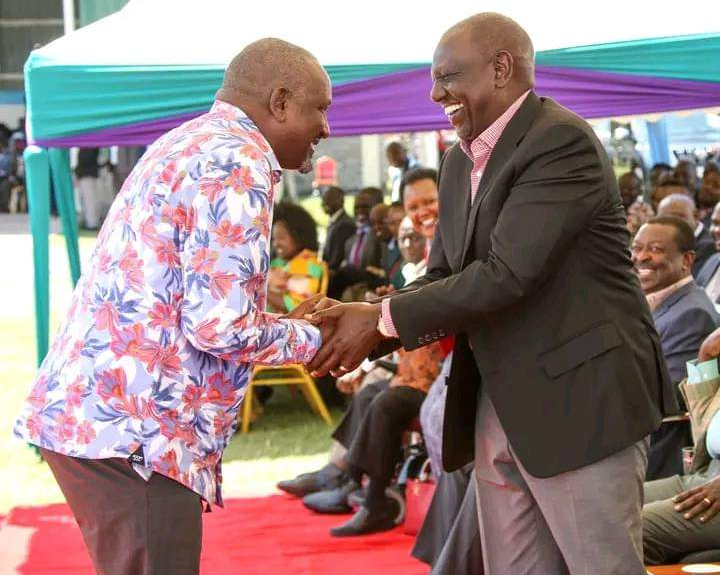 Kanu secretary general Nick Salat shakes hand with President William Ruto in Bomet on January 15, 2023.