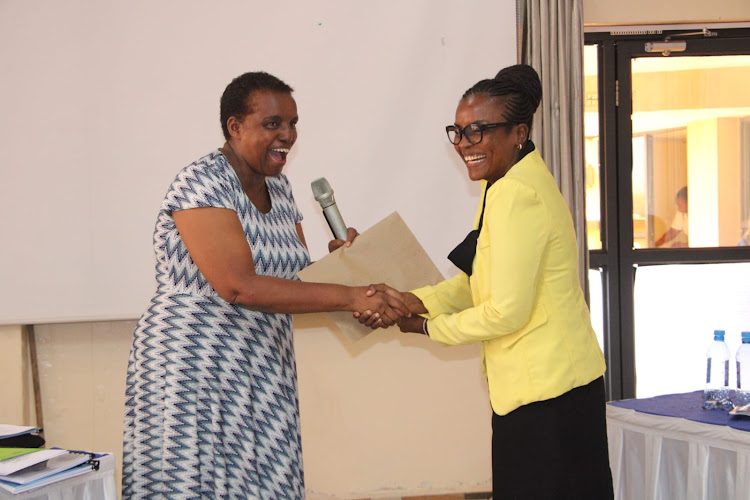 Taita Taveta Deputy Governor Christine Kilalo congratulate the newly appointed Tavevo managing director Rose Mbiko