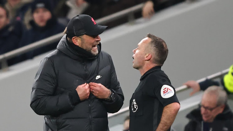 Liverpool manager Jurgen Klopp confronts referee Paul Tierney