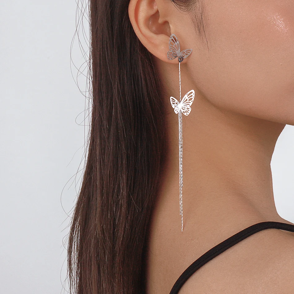 Lange tassel feeën oorbellen met holle vlinder. Voeg een magische touch toe aan je look. Elegantie en vrouwelijke charme.