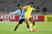 Lesego Radiakanyo of Botswana puts Lebohang Ramalepe of South Africa under pressure.  /Lefty Shivambu/Gallo Images