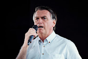 Former Brazilian President Jair Bolsonaro speaks at an event taking place in a restaurant at Dezerland amusement park in Orlando, Florida, US January 31, 2023. 