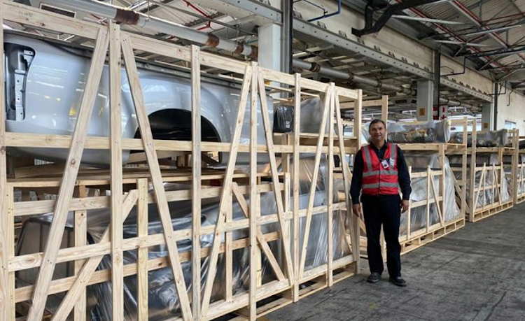 BAKKIE KITS: Isuzu Motors SA Knocked Down co-ordinator Lionel Terblanche with some of the kits ready to be shipped to Kenya