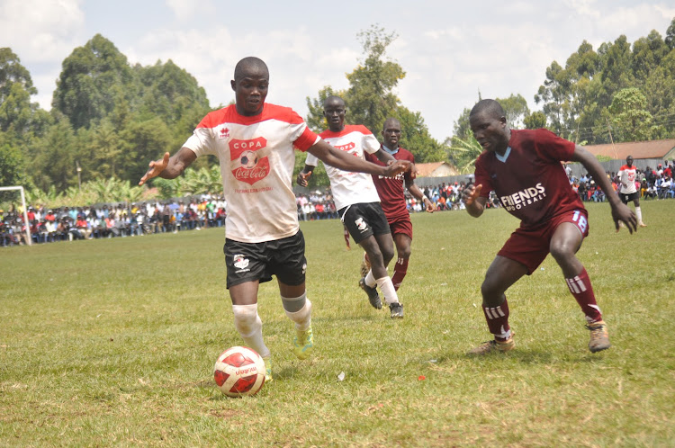 Part of action between Agore Sare(white) and Dagoreti High during the ongoing school games in Kakamega