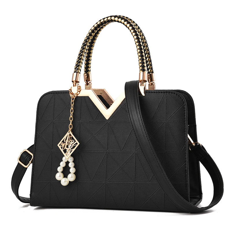 Bolso bandolera tipo concha para mujer, sencillo y elegante. Perfecto para llevar tus esenciales con estilo y comodidad, ideal para el día a día.