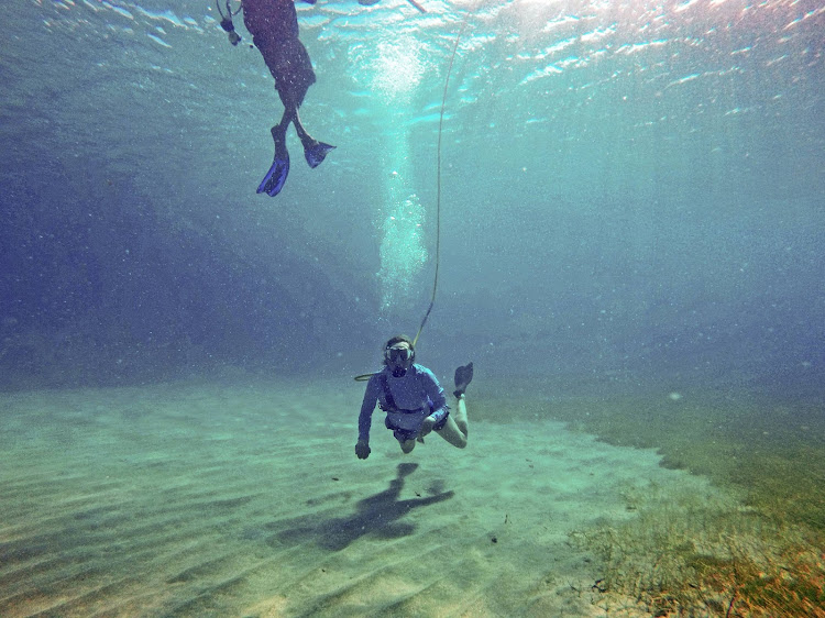 A look at snuba — a combination of snorkeling and diving — during an outing in St. Kitts.