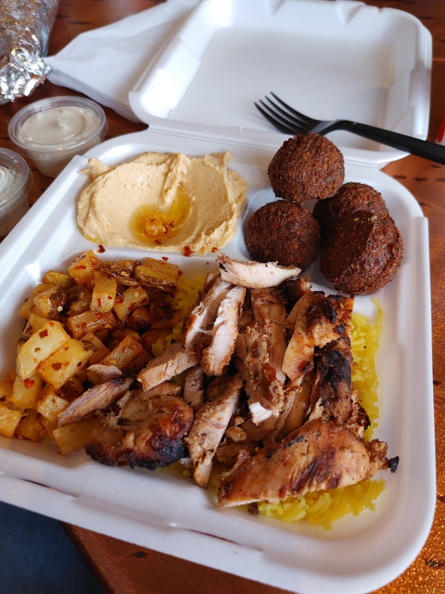 Chicken shawarma, spicy potato, hummus, rice, falafel