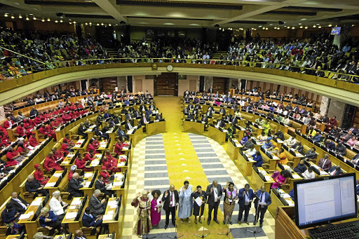 SA's newly-elected members of parliament were sworn into office in Cape Town yesterday. The members were sworn in by Chief Justice Mogoeng Mogoeng. /RODGER BOSCH /AFP