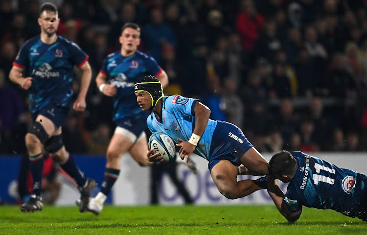 Kurt-Lee Arendse of the Bulls is tackled in Belfast on Saturday. Picture: Picture: RAMSEY CARDY/SPORTSFILE/GALLO IMAGES