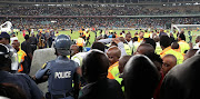 Fans vandalising the stadium during the 2018 Nedbank Cup match between Kaizer Chiefs and Free State Stars at Moses Mabhida Stadium, Durban on 21 April 2018.