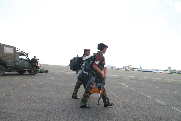 KDF troop from the Democratic Republic of Congo arrive at the Embakasi Garrison in Nairobi on December 21, 2023.